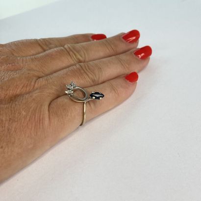 Bague serpent or pierres** dont une bleue...
