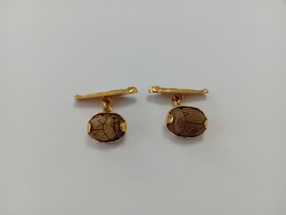 Pair of gold cufflinks with gemstones** AC...