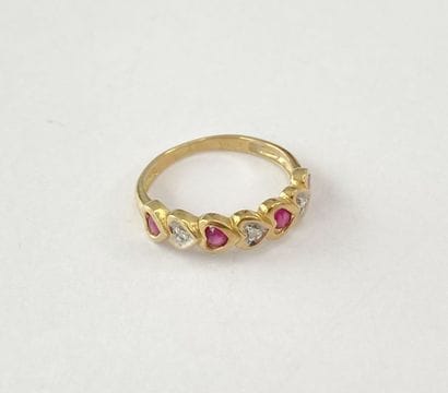 Bague or motif coeurs pierres** dgt 47 1,75...