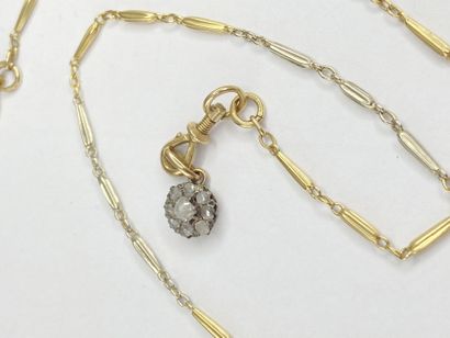 Chaine de montre 2 ors avec breloque pierres**...
