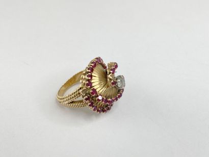 Intricately crafted gold tourbillon ring...