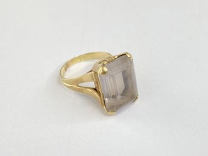 Gold ring with rectangular white stone**,...