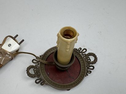Small candlestick made of chiseled bronze...
