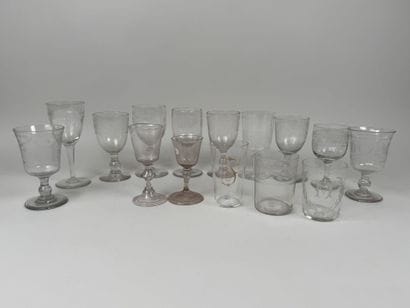 A collection of 15 stemmed glasses or tumblers...