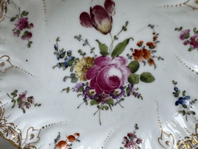 SAXE.
Two polychrome and gold porcelain bowls...