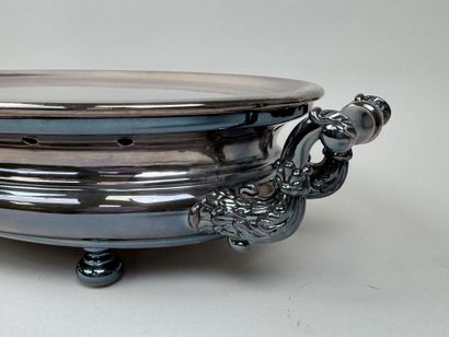 Large, oval-shaped double food warmer made...