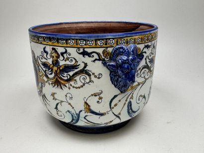 GIEN.
Polychrome earthenware planter on a...