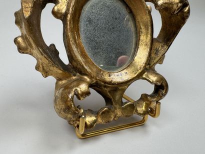 Small circular mirror made of gilded, openwork...