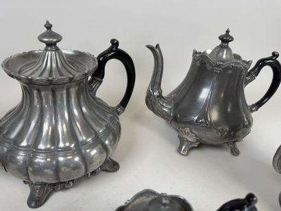 6 pewter shaped pieces including pourers.
H....