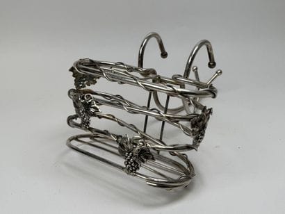 Silver plated metal bottle holder designed...
