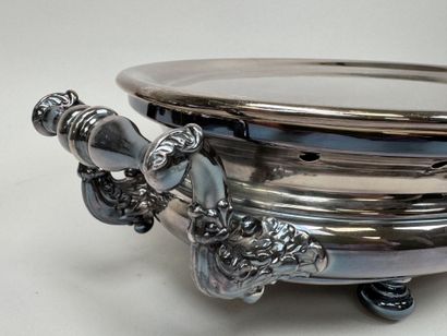 Large, oval-shaped double food warmer made...
