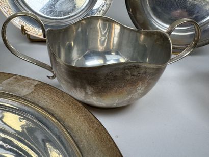Silver plated metal set including:
- two...