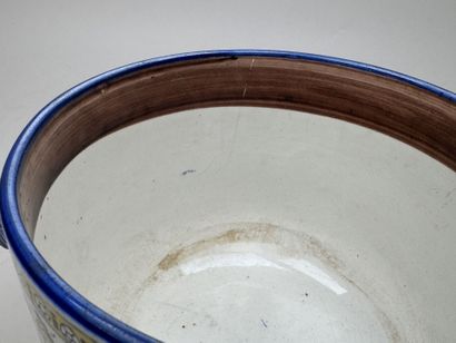 GIEN.
Polychrome earthenware planter on a...