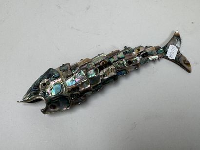 Articulated fish-shaped bottle opener made...