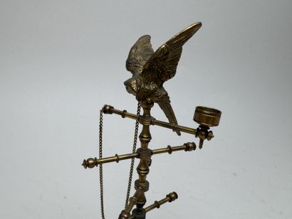 Small brass ring holder with a stylish eagle...