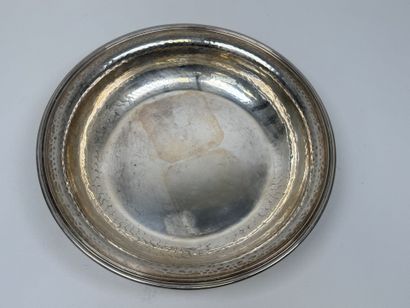 A circular, deep dish made of silver plated...
