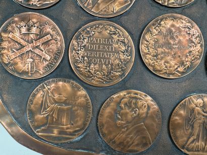 Large, coat-of-arms-shaped plaque made of...