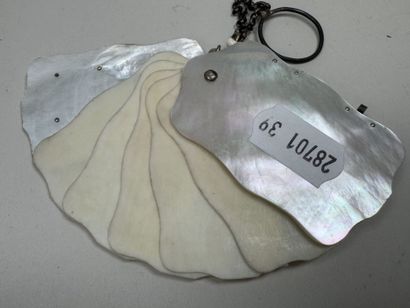 Set includes:
- a small dance card case made...