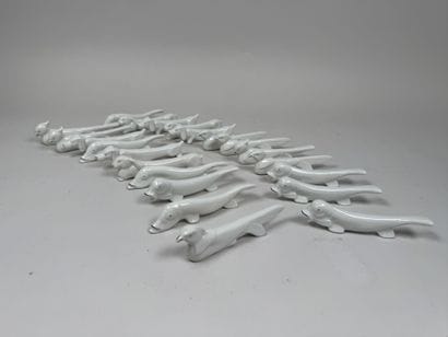 Set of 22 white porcelain knife holders with...