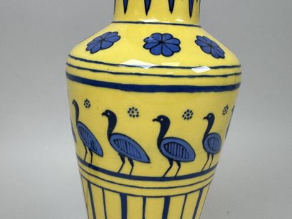 Yellow porcelain lamp decorated with birds...