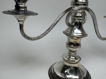 Pair of silver plated candlesticks with three...