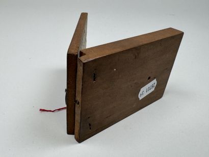 Small, fold-out pocket compass made of wood...