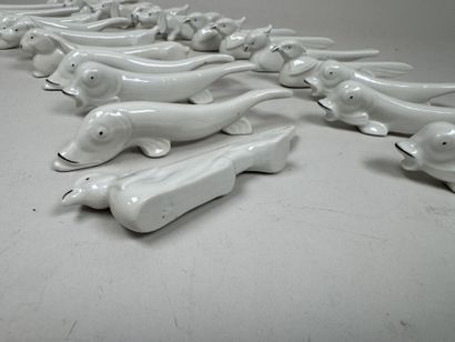 Set of 22 white porcelain knife holders with...