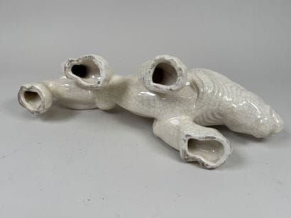Crackled ceramic figurine decorated with...