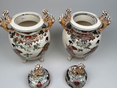 JAPAN, SATSUMA.
Pair of lidded pots in polychrome...