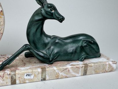 School, 20th century.
Antelope.
Marble clock...
