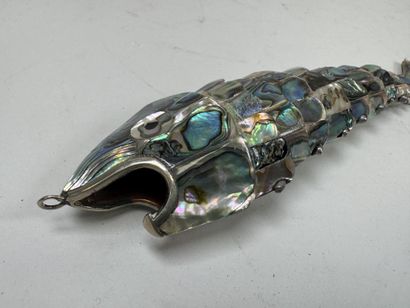 Articulated fish-shaped bottle opener made...