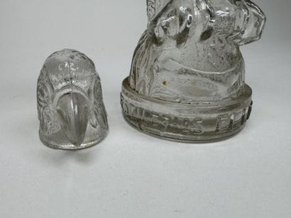 Molded glass promotional bottle featuring...