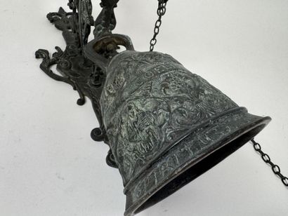Bell and stand made of patinated bronze,...