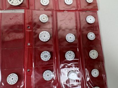A collection of 75 enameled pocket watch...