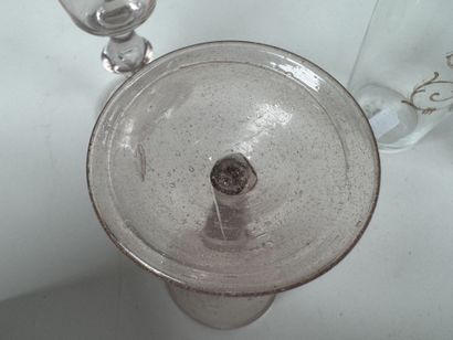 A collection of 15 stemmed glasses or tumblers...