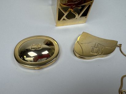 Christian DIOR.
Poudrier et duo rouges à...