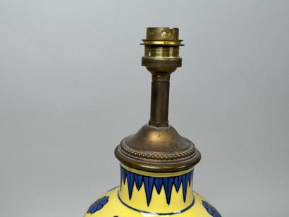 Yellow porcelain lamp decorated with birds...