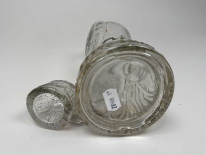 Molded glass promotional bottle featuring...