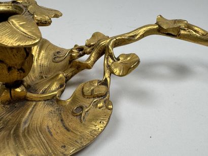 Handheld candlestick made of gilded bronze,...