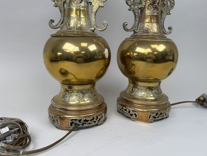 INDOCHINA, 20th century.
Pair of brass or...