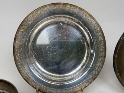 Silver plated metal set including:
- two...