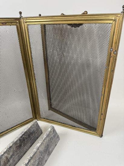 Set includes:
- a pair of bronze and cast-iron...