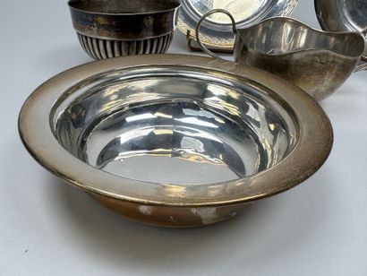 Silver plated metal set including:
- two...