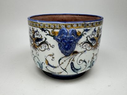 GIEN.
Polychrome earthenware planter on a...