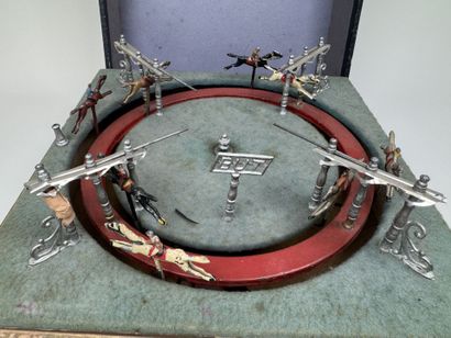 Horse race.
Circular mechanical toy with...