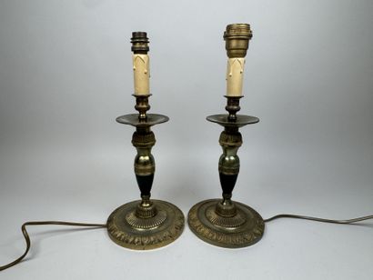 Pair of gilded bronze candlesticks with green...