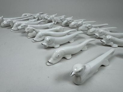 Set of 22 white porcelain knife holders with...