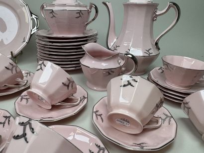 Ceramic dessert serving set on a pink background...