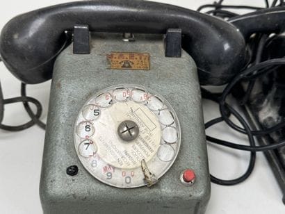 Set of 3 Bakelite and metal telephones.
14...