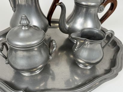 A coffee and tea service set made of pewter...